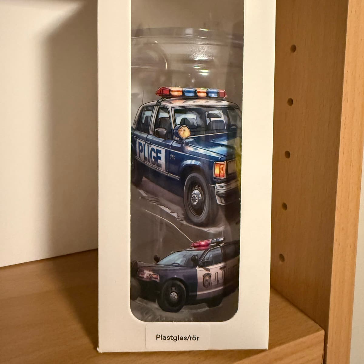 Plastglas með lögreglumyndum