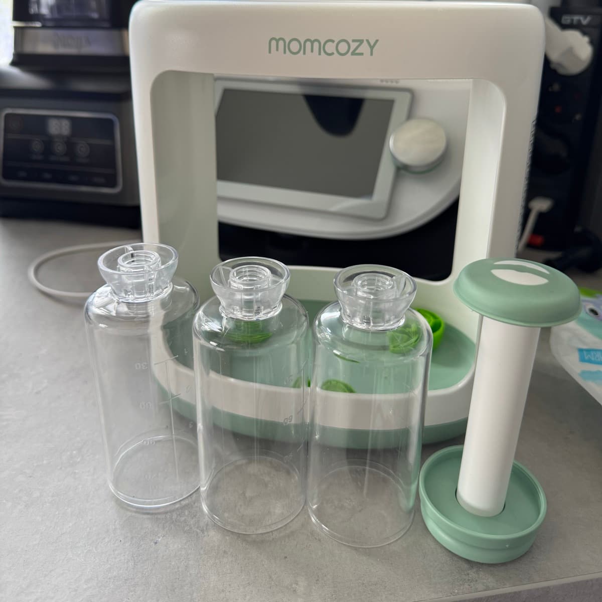 Momcozy barnamatstæki og fjölnota pokar