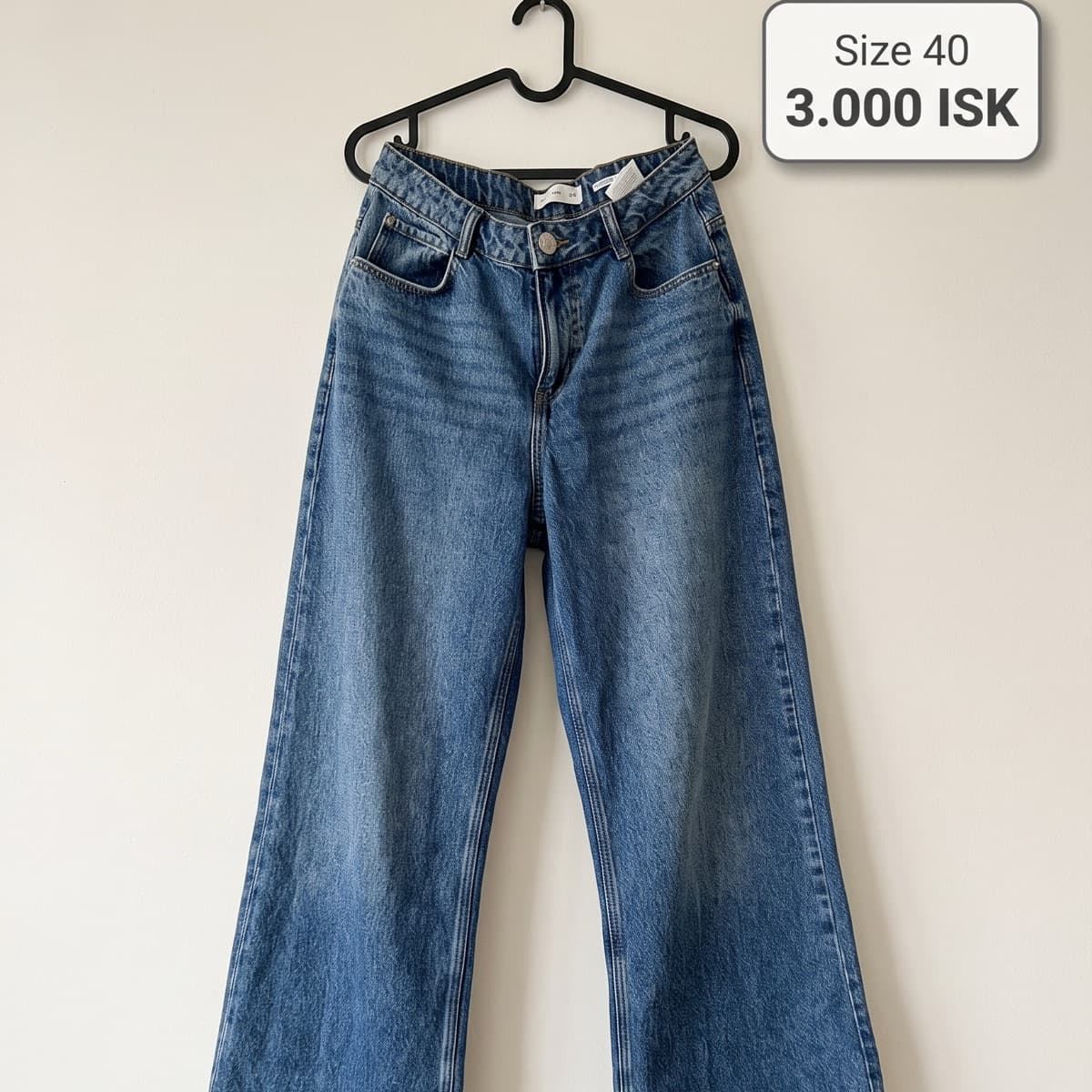Víðar gallabuxur